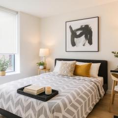 Trendy 2 Bedroom Suite Close to SkyTrain and Seawall