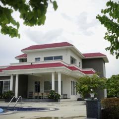 StayVista at Vacanza Villa - Pool, Lawn & Theatre