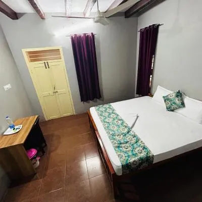 ERA Heritage Inn，位于科泽科德的酒店