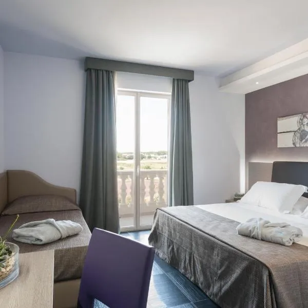 乐敦套房酒店，位于切萨雷奥港的酒店