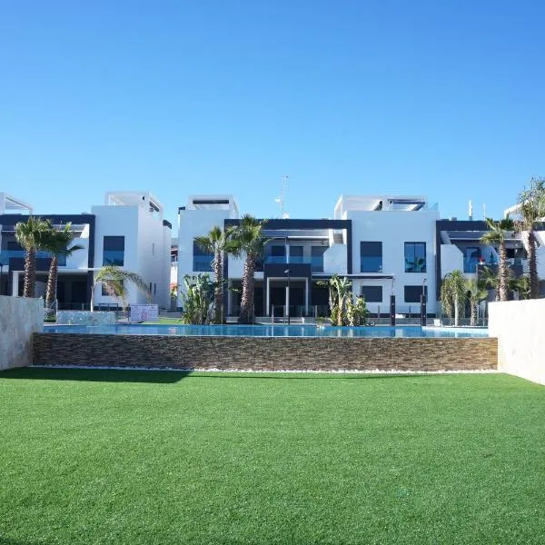 拉泽尼亚绿洲海滩公寓，位于奥里韦拉海滩的酒店