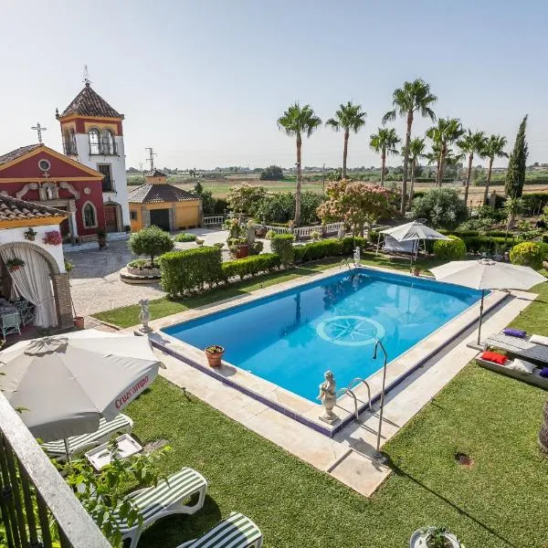 Casa de Campo con Piscina en Sevilla en los Palacios y Villafranca，位于洛斯帕拉西奥西维利亚夫兰卡的酒店