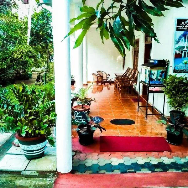 Sudu Neluma Home Stay，位于波隆纳鲁沃的酒店