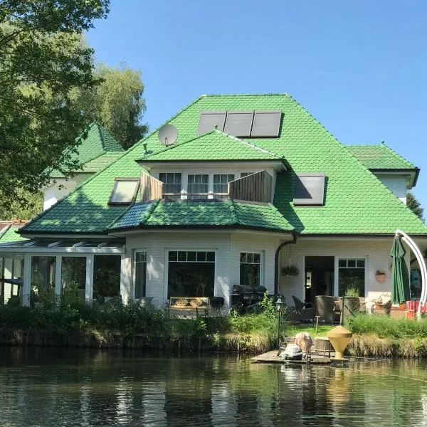 Moderne Maisonette-Wohnung am Karpfenteich; modern Apartment with view of the carp pond，位于Lutzhorn的酒店