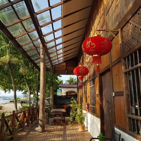 体验岛文化遗址度假屋，位于立咯海滩的酒店