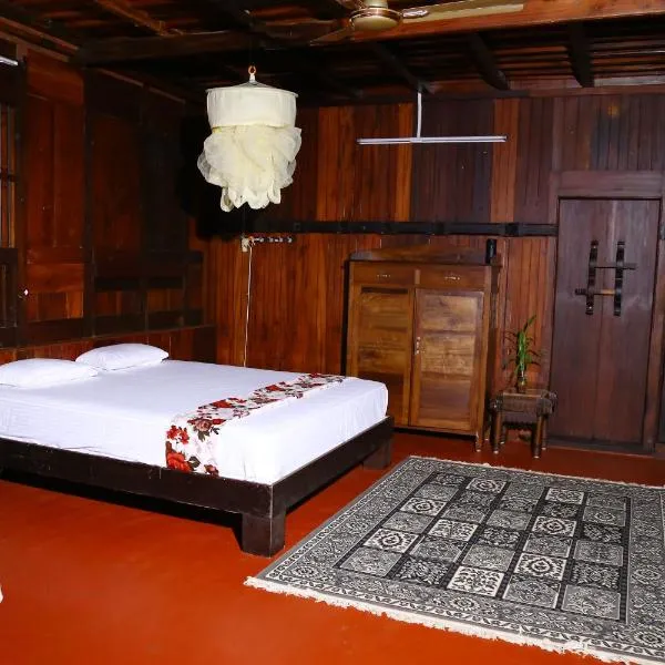 Malayoram Heritage Villa Munnar，位于Kūmudi的酒店