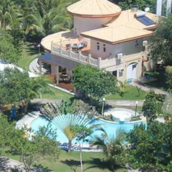 卡比鲁日落潜水海滩度假村，位于Calayugan Norte的酒店