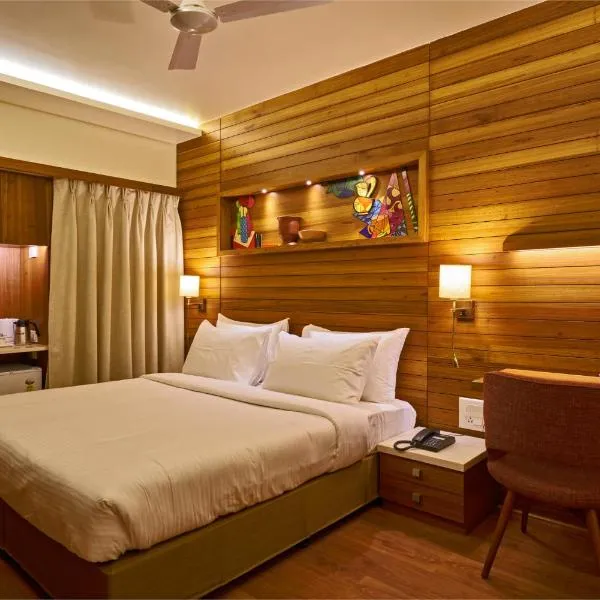 Hotel Atharv Top Rated Business Hotel in Kolhapur，位于Unchagao的酒店