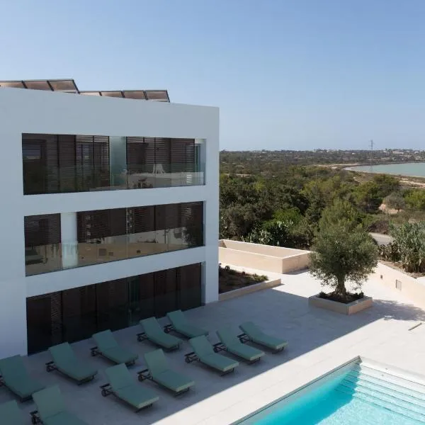 Sa Pedrera Suites & Spa，位于埃斯普霍斯的酒店