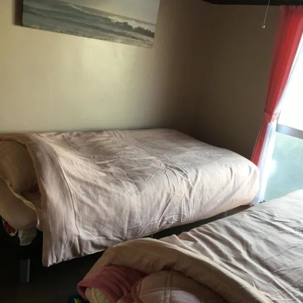 Kurosaki Guesthouse 403，位于Mizumaki的酒店