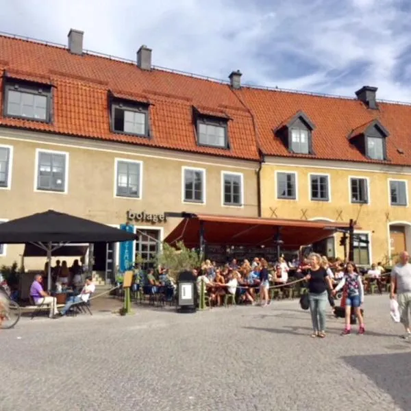 Stora Torget - Visby Lägenhetshotell，位于维斯比的酒店