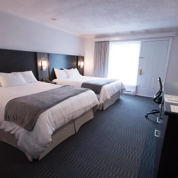 德斯艾斯科尔斯酒店，位于Amos的酒店