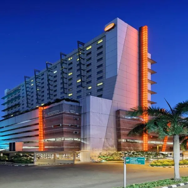 雅加达椰风伽德哈里斯酒店及会议中心，位于Pulokendal的酒店