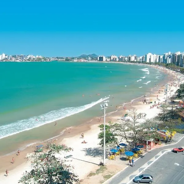 SEGUNDA CASA - Seu cantinho em Guarapari, 1 minuto a pé da Praia do Morro! Suítes confortáveis e modernas - Para casal ou para grupos de até 5 pessoas，位于蓬塔达弗塔的酒店