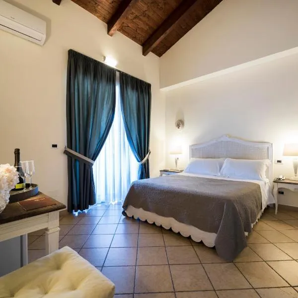 特纳塔达莫尔酒店，位于Montecorvino Pugliano的酒店