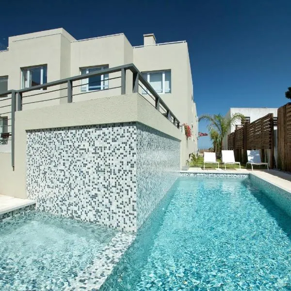 兰布拉皇家设计公寓酒店，位于Barra de Carrasco的酒店
