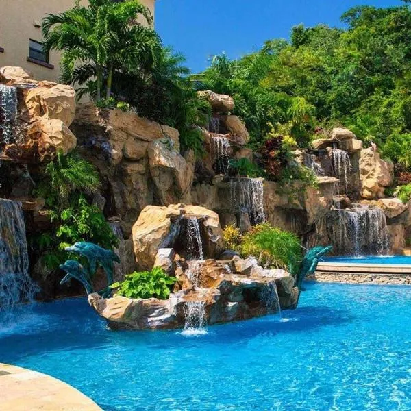 罗丹菠萝别墅号角套房酒店，位于Punta Caribe的酒店
