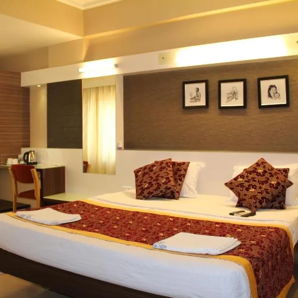 Hotel Pooja International，位于Harihar的酒店