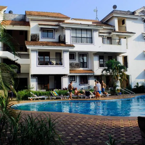 Susegad Suites Goa Apartments & Villas Riviera Hermitage Arpora，位于阿伯来的酒店