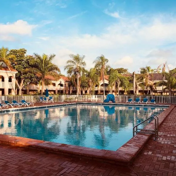 大棕榈树Spa高尔夫度假酒店，位于彭布罗克派恩斯的酒店