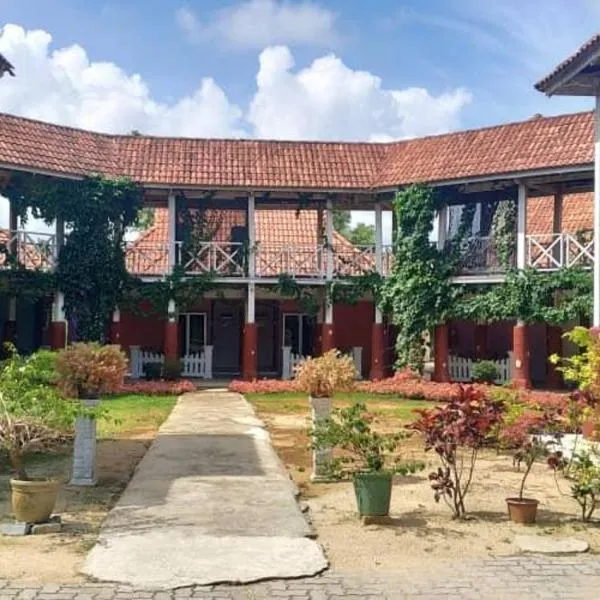 伊兹村庄酒店，位于Kampong Seberang Timor的酒店