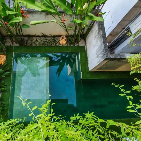 Kuta Suci Guesthouse,位于库塔的酒店