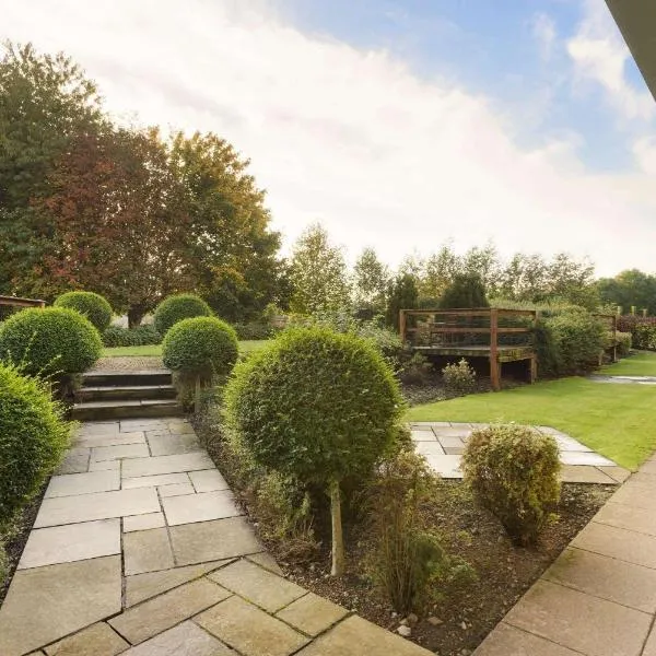 华美达雷克斯汉姆广场酒店，位于雷克瑟姆的酒店