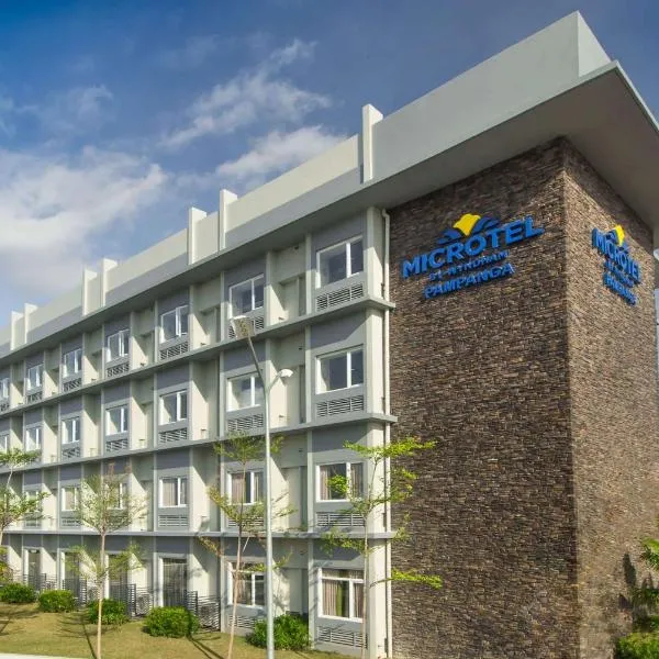 Microtel Inn & Suites by Wyndham San Fernando，位于Del Rosario的酒店