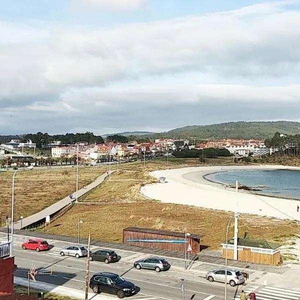 Atico a pie de playa Portonovo，位于桑亨霍的酒店