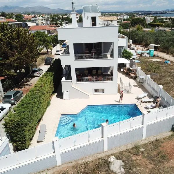 Villa d'Irene-near athens airport , 200 meters from the beach davis，位于阿特米达的酒店