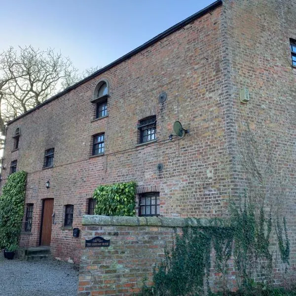 The Carriage House, Bilbrough York Sleeps 24，位于比尔伯勒的酒店