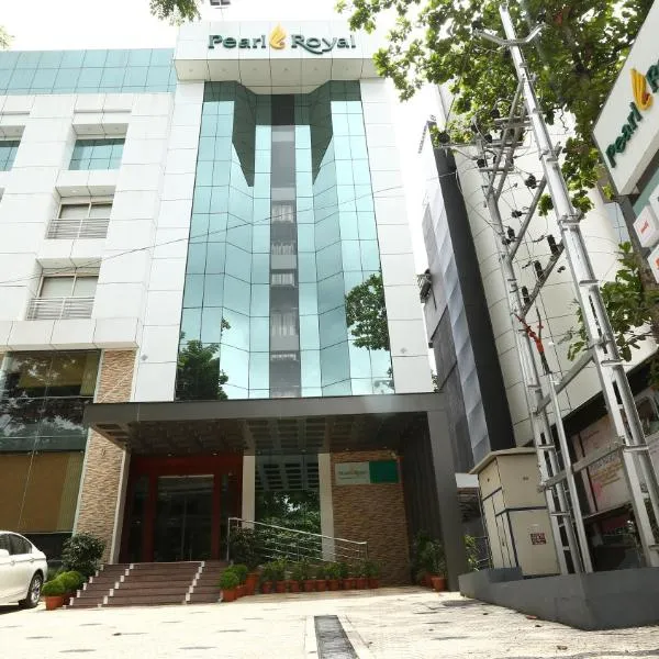 PEARL ROYAL INTERNATIONAL HOTELS & RESORTS PVT LTD，位于Kuttāttukulam的酒店
