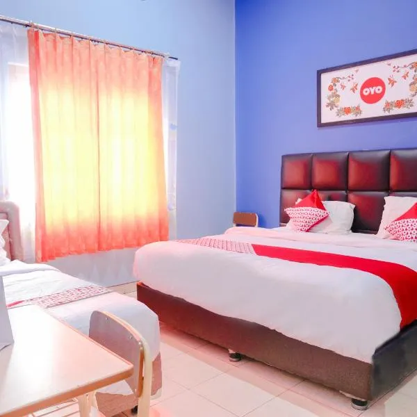 OYO 778 Guest House Amalia Malang，位于Wendit的酒店