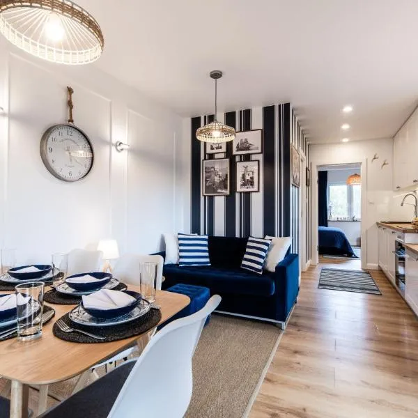 Niebieskie Apartamenty Rowy Apartament z klimatyzacją 100 m do plaży，位于罗威的酒店