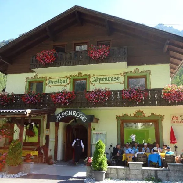 阿尔卑罗斯旅馆及G尼娜膳食公寓，位于欧布博格埃姆布伦纳的酒店