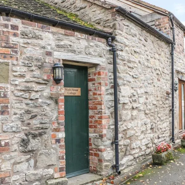 Wash House Cottage，位于马奇温洛克的酒店