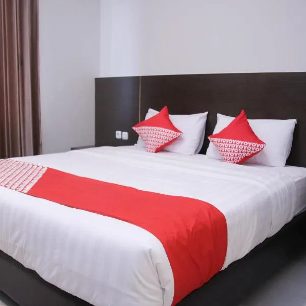 Super OYO 1006 Azzahra Guest House Syariah，位于Batu Merah的酒店