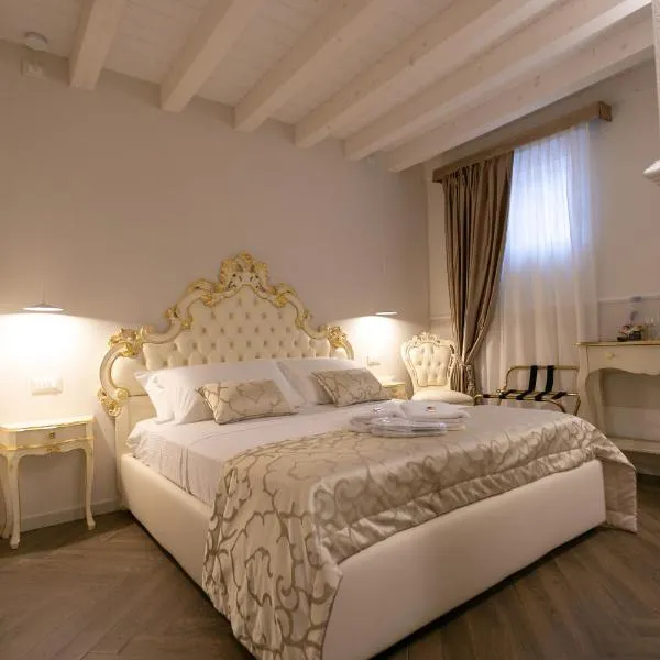 Ca' Vittoria Apartsuite House Chioggia，位于索托马里纳的酒店