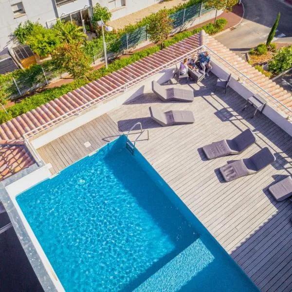 Hotel Grand Cap Rooftop Pool，位于Florensac的酒店