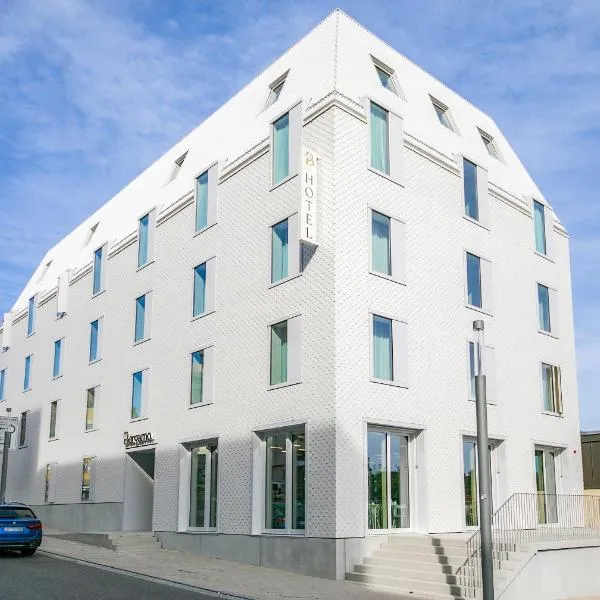 Hotel Bergamo Modern & zentral in Ludwigsburg Klimaanlage 3 Min zum Schloss WLAN Frühstück optional besonderes nachhaltiges Stadthotel in moderner Holzbauweise，位于路德维希堡的酒店