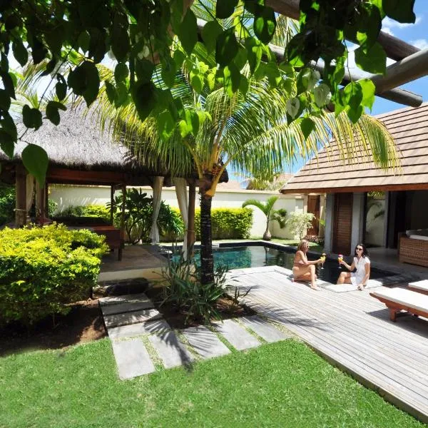 Oasis Villas by Fine & Country，位于格兰贝伊的酒店