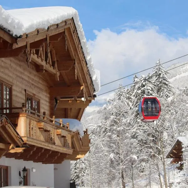 Feriendorf Joggler - Chalets nahe der Gondel，位于齐勒河谷采尔的酒店