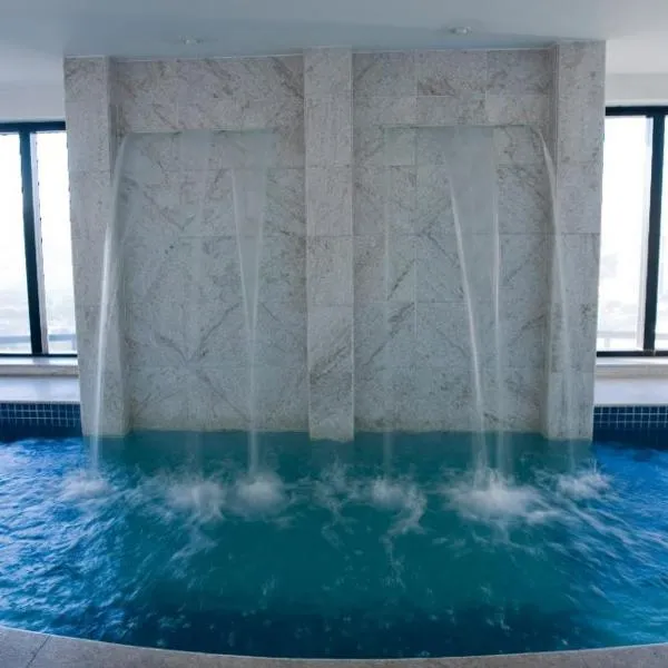 Airport Business Flat Guarulhos - São Paulo，位于瓜鲁柳斯的酒店
