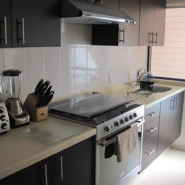 Linda y Acogedora Suite Áreas verdes Alberca Zona Norte 27B，位于Mendiola的酒店