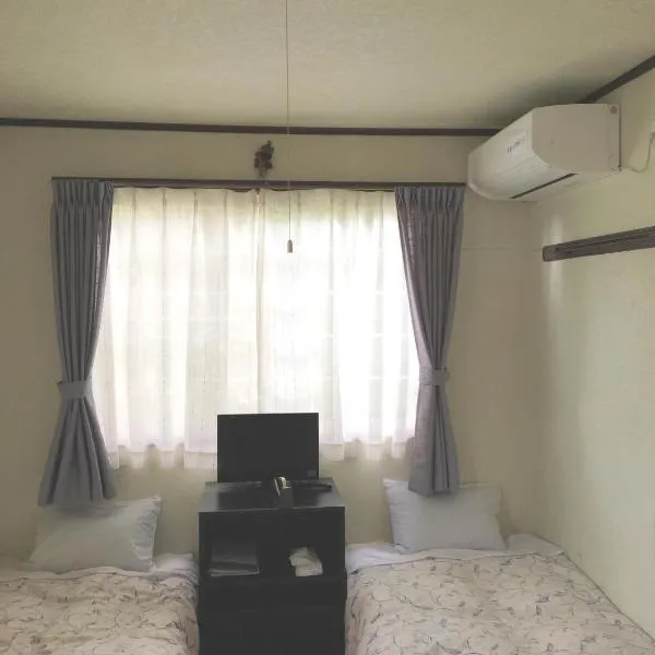 落聘宾馆，位于片品村的酒店