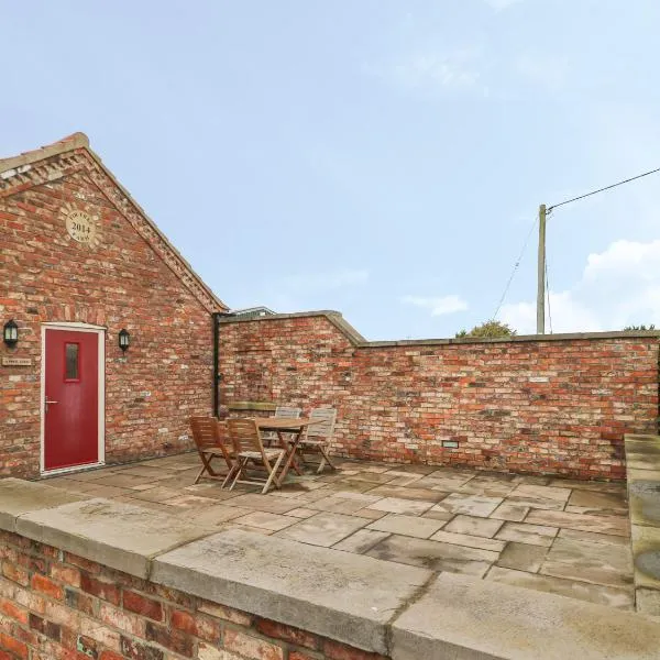 Apple Tree Cottage，位于Dunnington的酒店