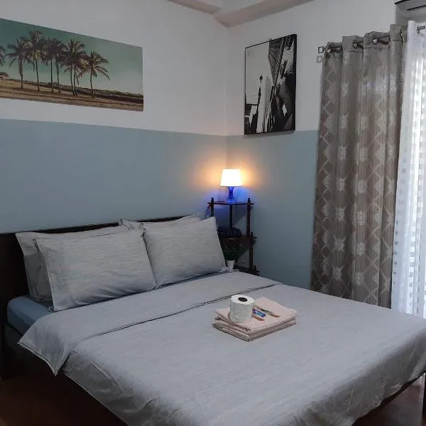 Cozy condo unit 5mins from Mactan Cebu Int'l Airport with Netflix，位于麦克坦的酒店