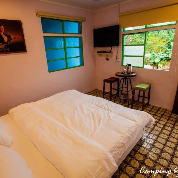 睡海邊-雅房包棟，位于Tung-ao的酒店