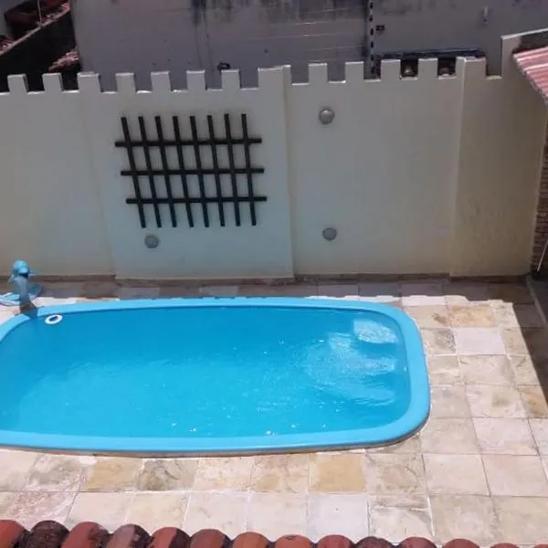 LINDO SOBRADO COM PISCINA PARA ATÉ 10 HÓSPEDES!，位于São Gonçalo do Amarante的酒店