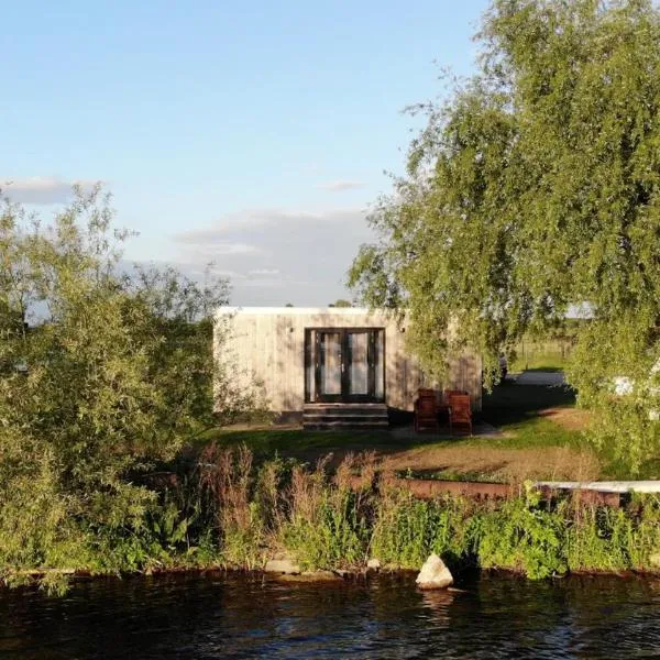 Tiny House by the water - de Schans Alphen，位于Alphen的酒店